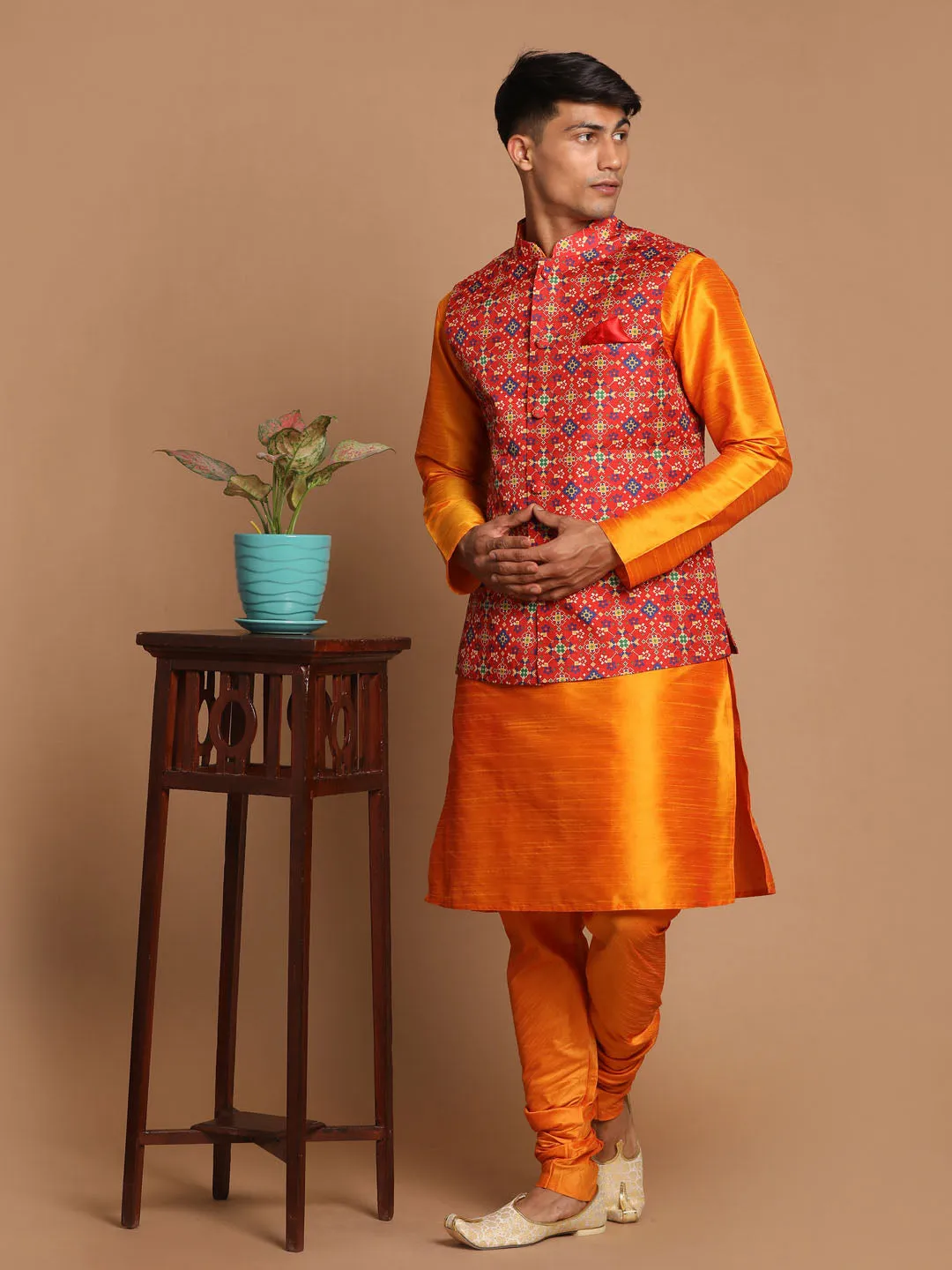 Jashvi Maroon Patola Print Nehru Jacket With Orange kurta Pyjama Set